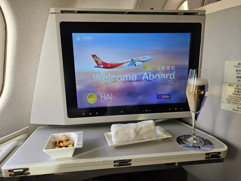 Velkomstdrink, håndklæde og skærm