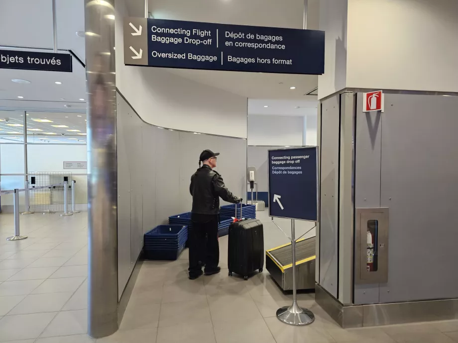 Partition til genkontrol af transferbagage
