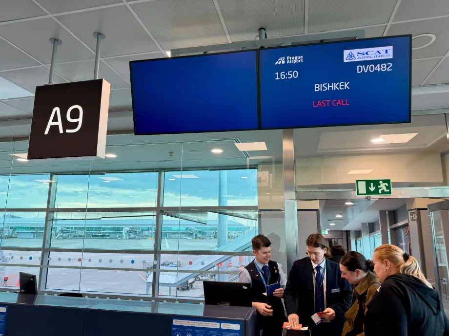 Boarding for fly til Sanya via Bishkek