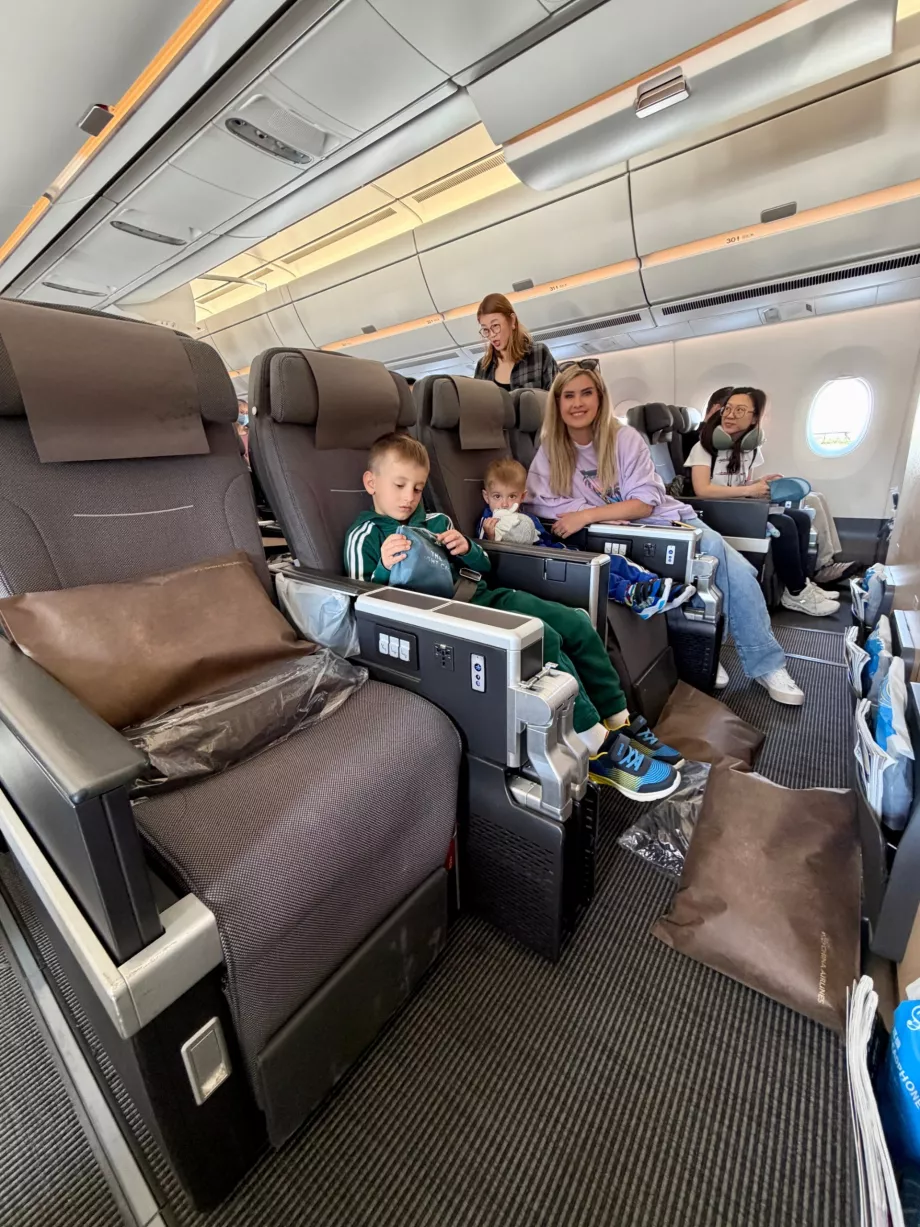 Vores familie på første række Premium Economy